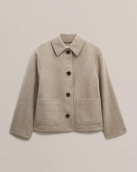 Expert dry cleaning and pressing for coats & jackets in Bahrain